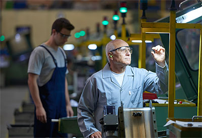 Man working in a production facility.